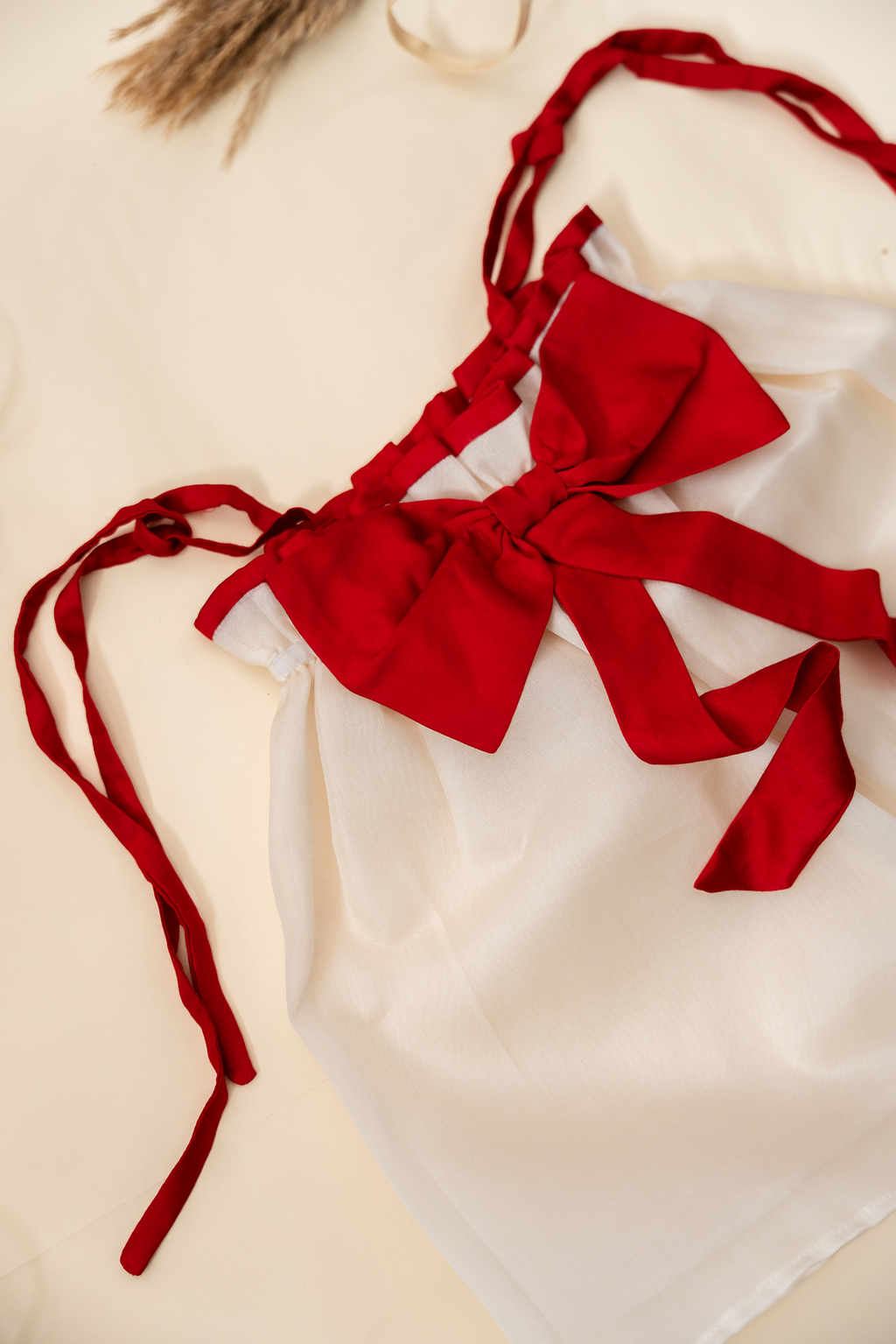 Off-White Top with Red Bow and Tie-up Straps Paired with Red Bloomers Set